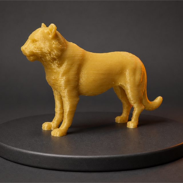 Zlato rjava 3D-tiskana figura leva